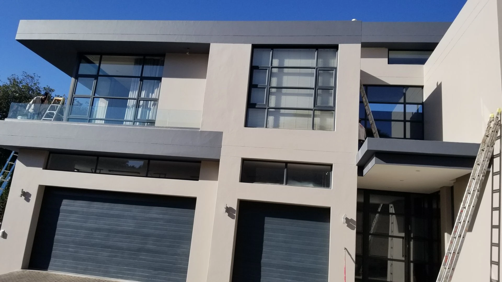 Professional painter applying quality paint finish to interior wall in Johannesburg home